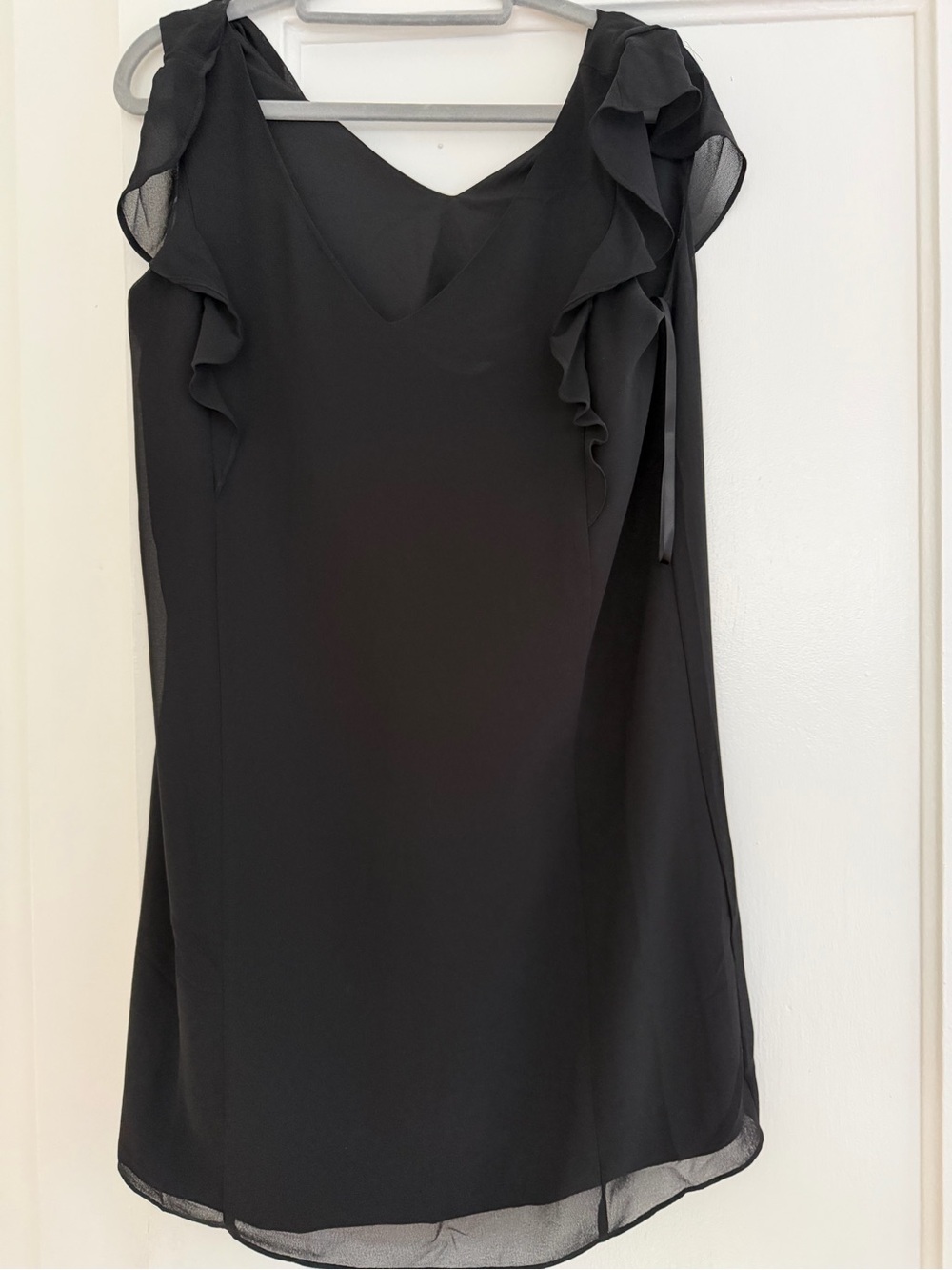 Naked Zebra Black Ruffle Shoulder Tunic